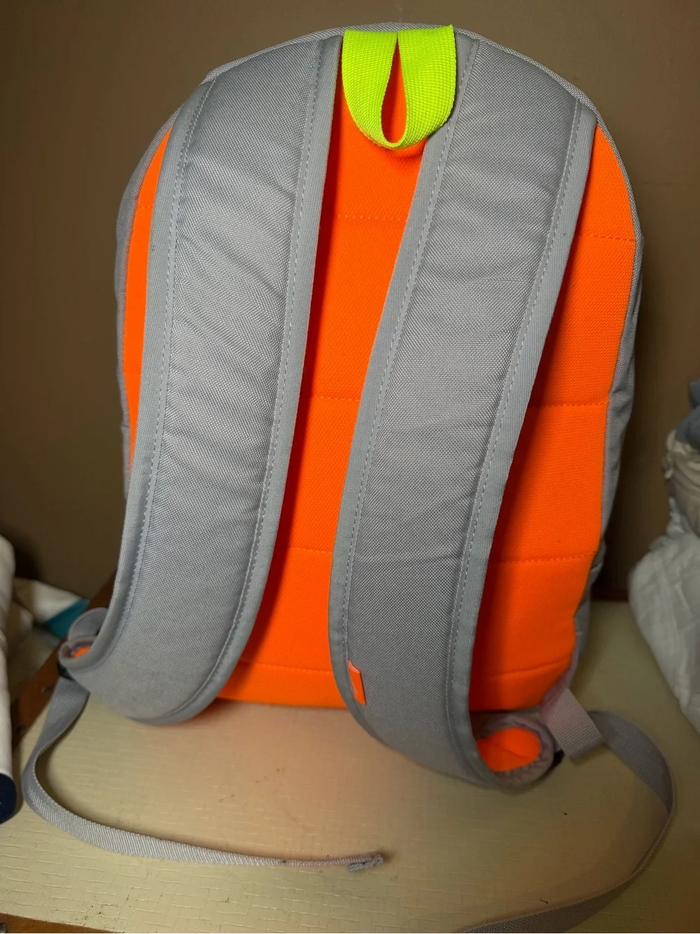 Nike Light Gray Backpack with Bright Orange Logo and Neon Accents